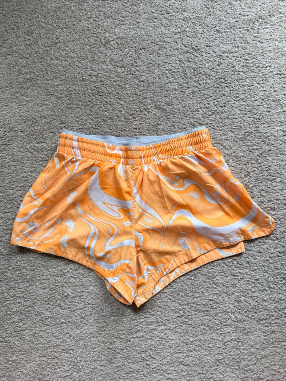 Fabletics Orange and White Swirl Running Shorts